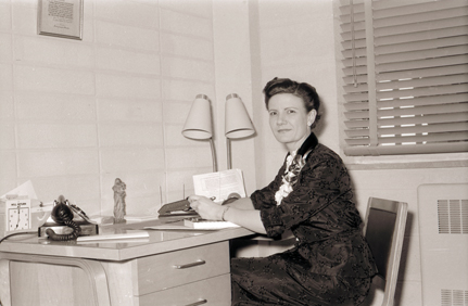 Mary Bruemmer at Desk